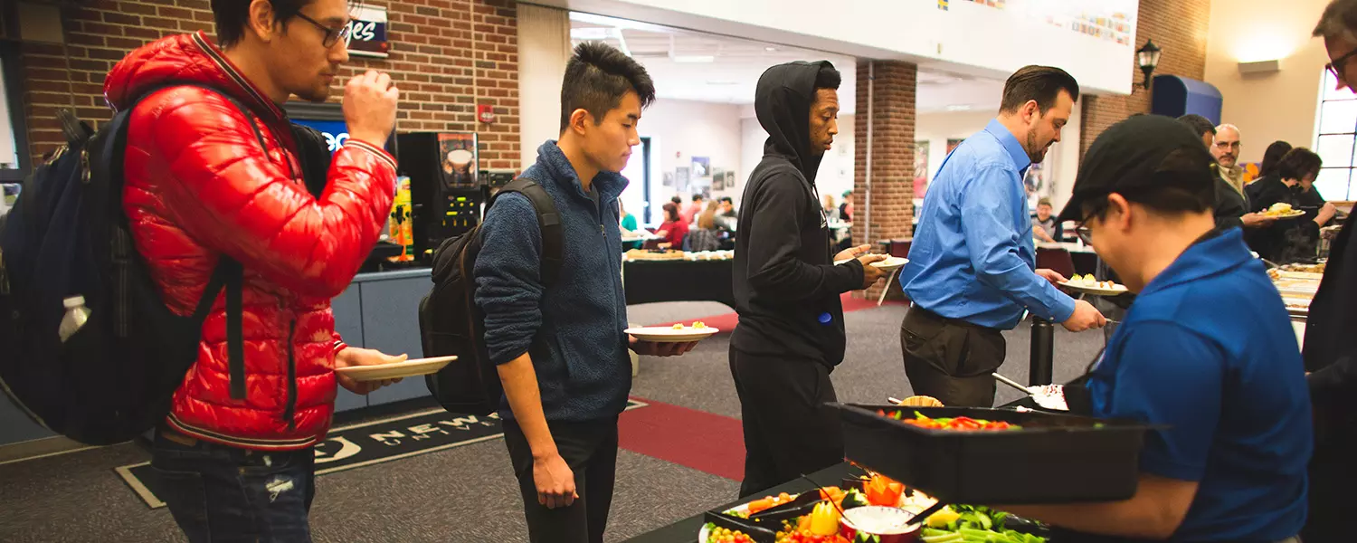 Students, faculty, and staff gather in the Mabee Dining Center to celebrate a special Thanksgiving meal.