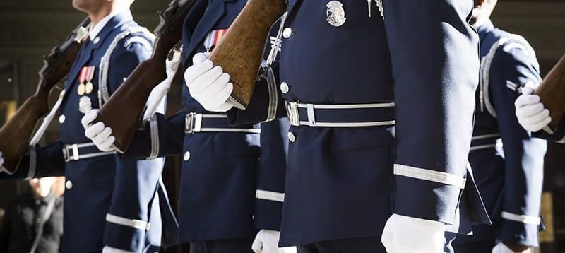 Military officers in blues dress uniform